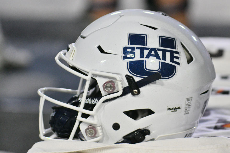 ALBUQUERQUE, NEW MEXICO - NOVEMBER 24: A Utah State Aggies helmet is placed on the sideline during the second half of the game between the Aggies and the New Mexico Lobos at University Stadium on November 24, 2023 in Albuquerque, New Mexico. . The Aggies beat the Lobos 44-41 in 2OT. (Photo by Sam Wasson/Getty Images)